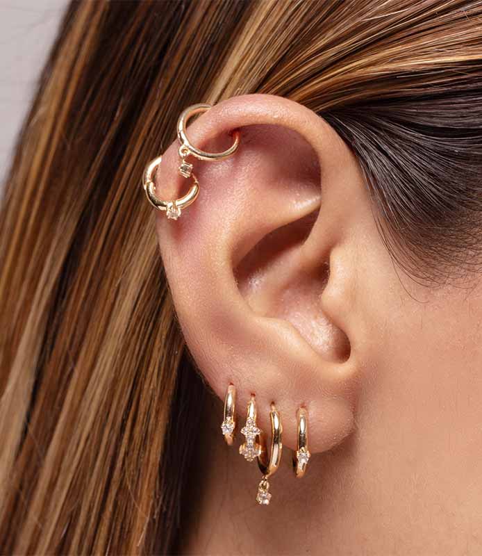 Piercing von der Marke das Ohr